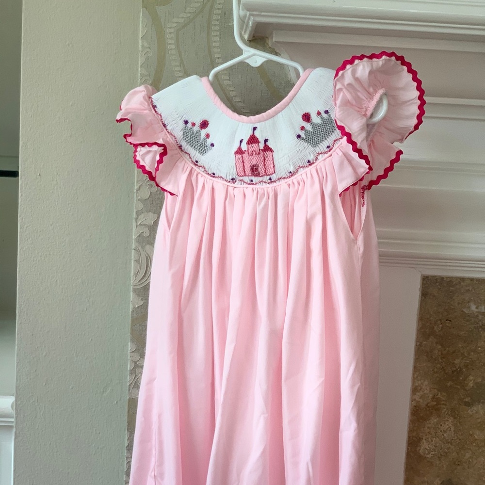 Adorable crown and castle smocked dress